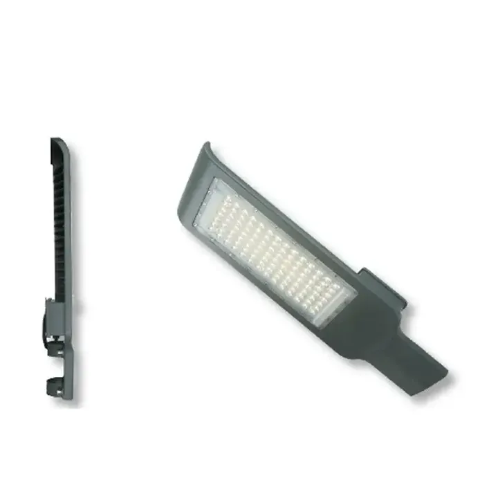 Street light head in sand grey shown from the front and side