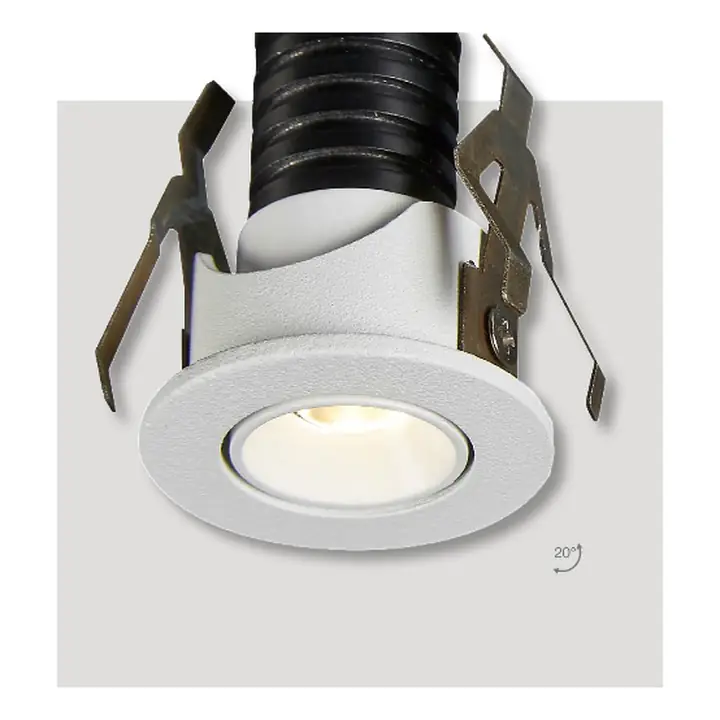 Alpha mini recessed spotlight with its spring clips extended