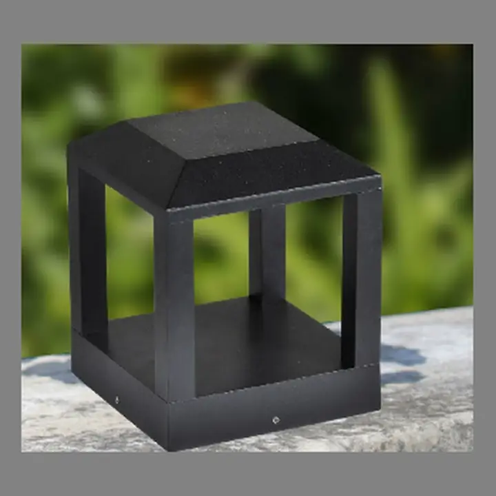 Dill open-frame gate lantern in dark grey on a stone ledge
