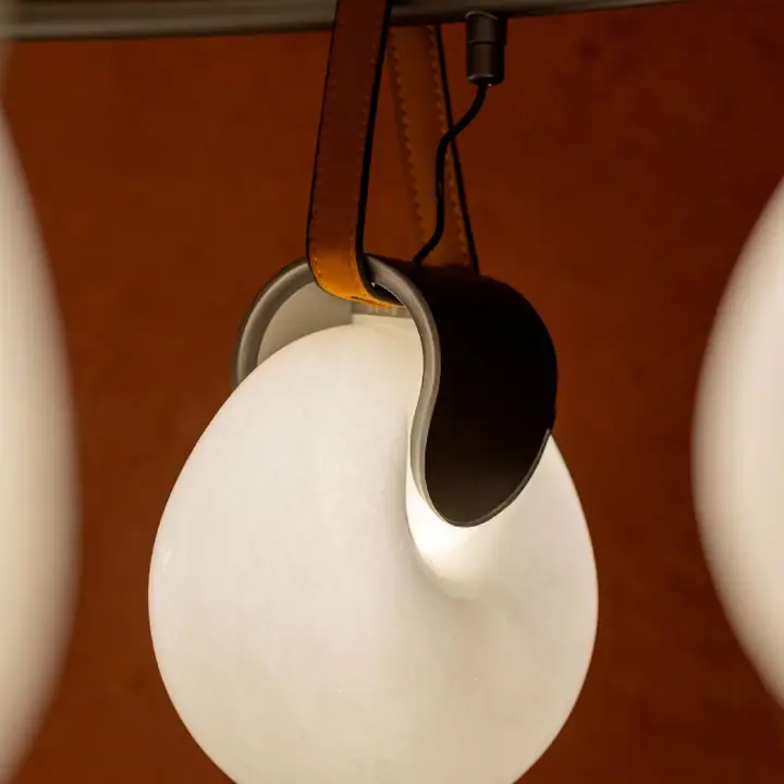 Kernel pendant with a bulbous cream glass shade