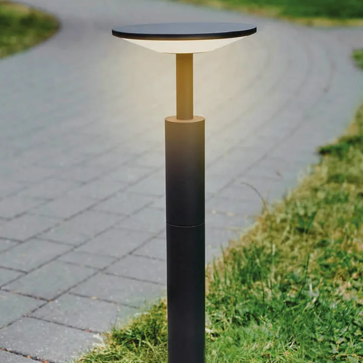 Scandia bollard beside a paved garden walkway